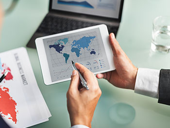 Mapping the Merger: Analysing the Ripple Effect of Global Trade on M&A Volumes